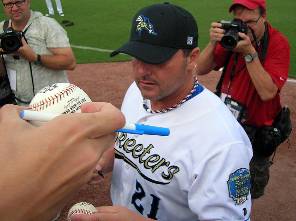 Roger Clemens signs autographs as he takes to the field for his first game as a player for the Sugar Land Skeeters in 2012. He and his son Koby, who also played for the Skeeters, will return this year to co-manage one of the four teams the Skeeters have created in a new pro baseball league that will play games at Constellation Field.